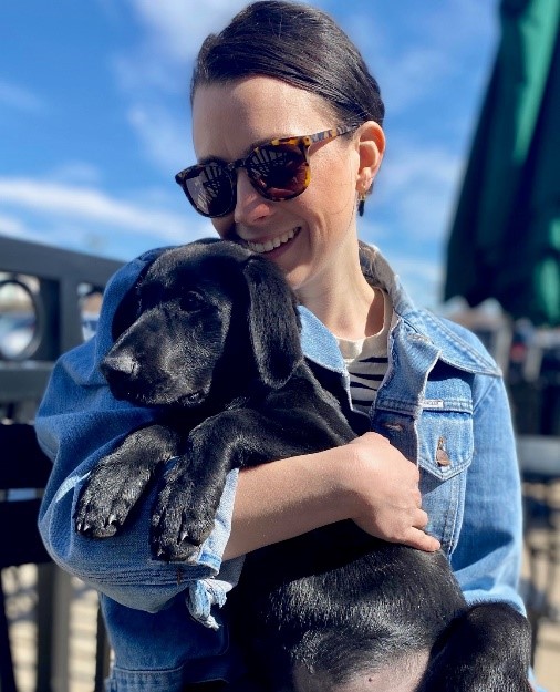 Jamie F. with her puppy